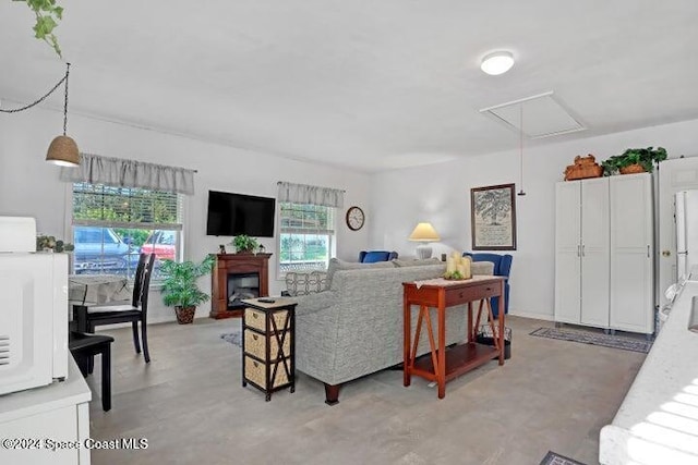 living room featuring plenty of natural light