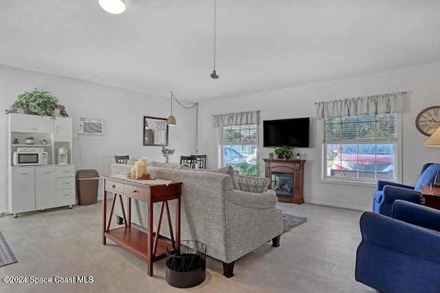 living room featuring a wealth of natural light