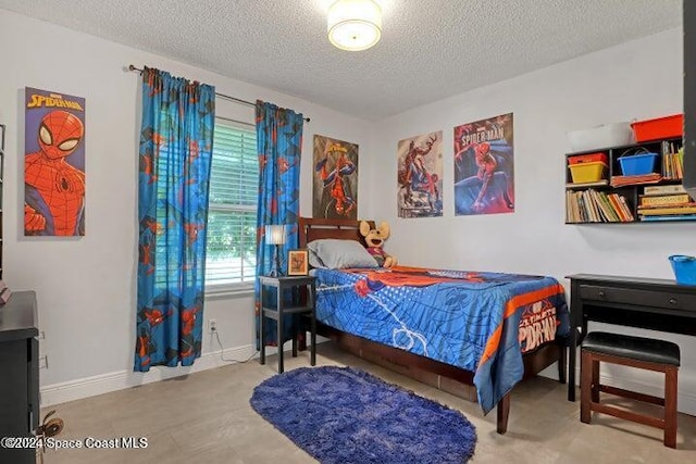 bedroom with a textured ceiling