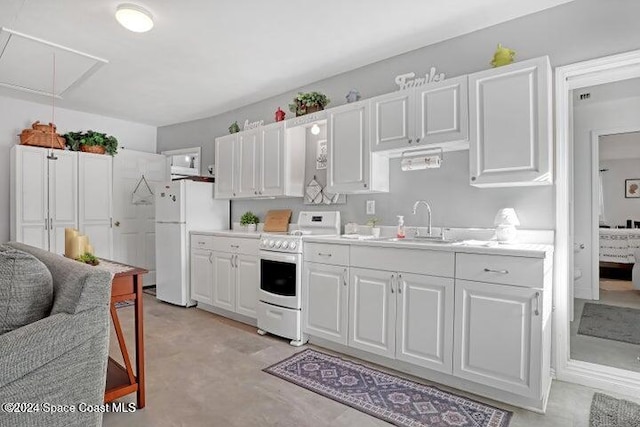 kitchen featuring white cabinets, white appliances, and sink