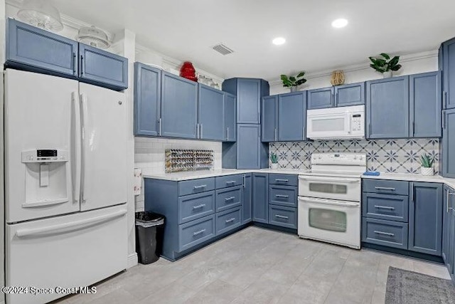 kitchen with tasteful backsplash, white appliances, and blue cabinets