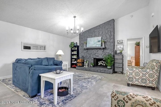 living room featuring a chandelier, a textured ceiling, high vaulted ceiling, and a stone fireplace