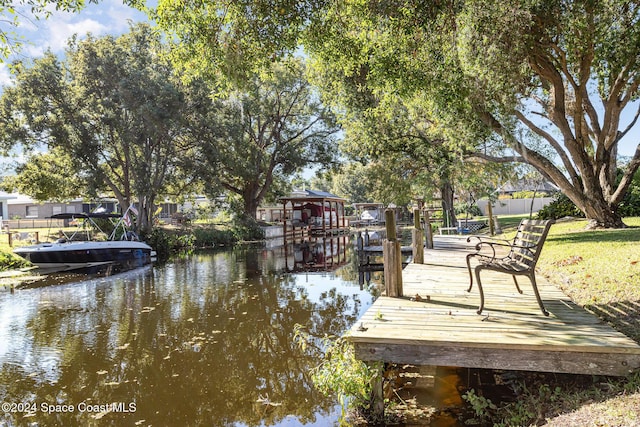 dock area featuring a water view