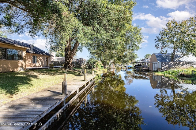 dock area featuring a water view