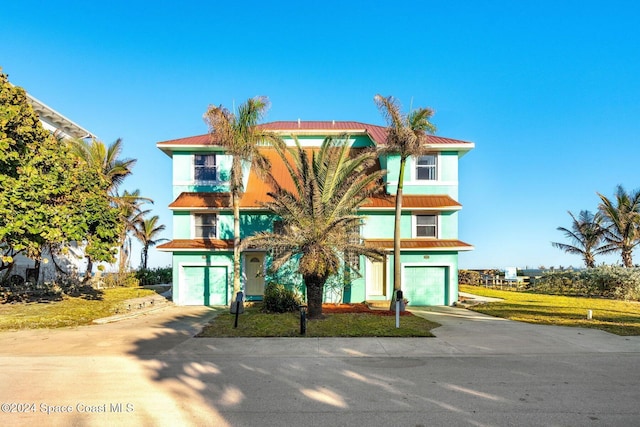 view of front of property with a garage