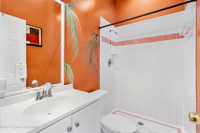 full bathroom with toilet, a shower stall, and vanity