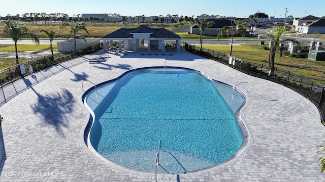 view of pool featuring a patio