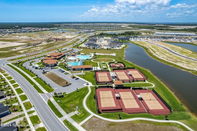 bird's eye view with a water view