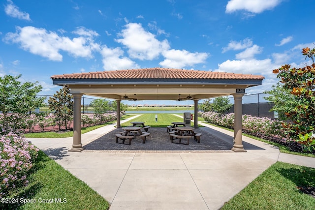 view of patio / terrace featuring a gazebo and ceiling fan