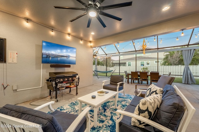 tiled living room featuring ceiling fan