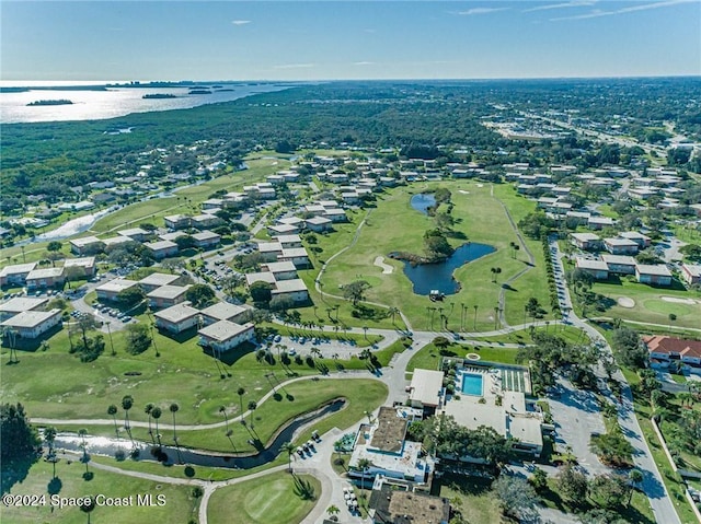 drone / aerial view with a water view