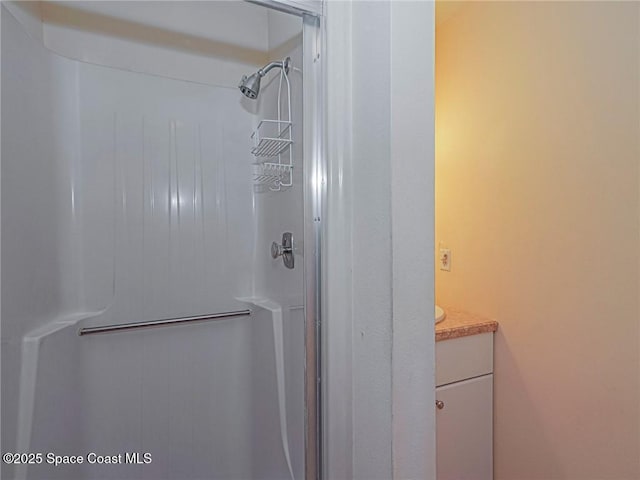 28 Pine Arbor Ln Unit 206, Vero Beach, FL 32962 - interior space featuring a shower stall and vanity