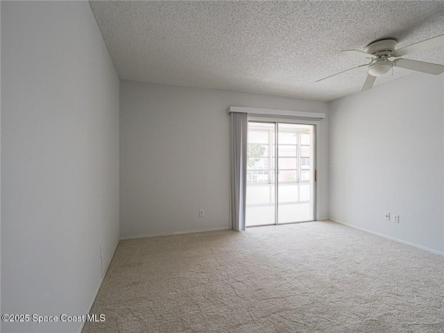 28 Pine Arbor Ln Unit 206, Vero Beach, FL 32962 - carpeted empty room featuring a ceiling fan, a textured ceiling, and baseboards