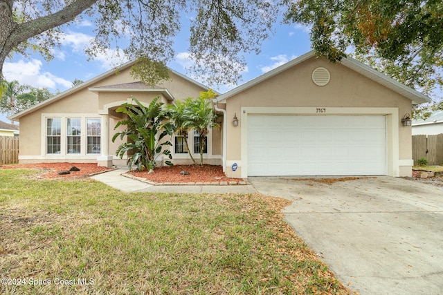 single story home with a garage and a front yard