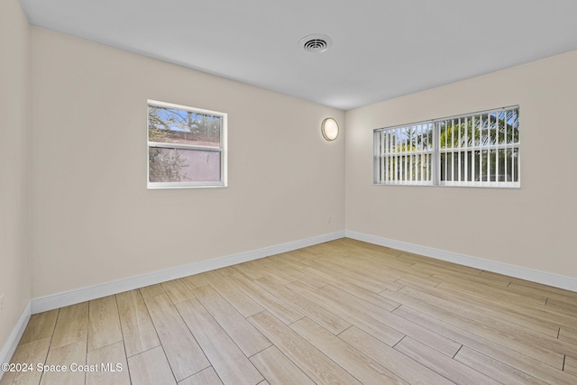 empty room featuring light hardwood / wood-style floors