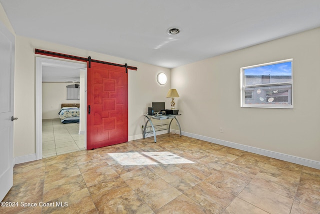 entrance foyer with a barn door