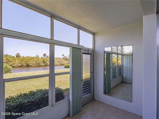 2800 Indian River Blvd Unit L-2, Vero Beach, FL 32960 - unfurnished sunroom with a water view and healthy amount of natural light