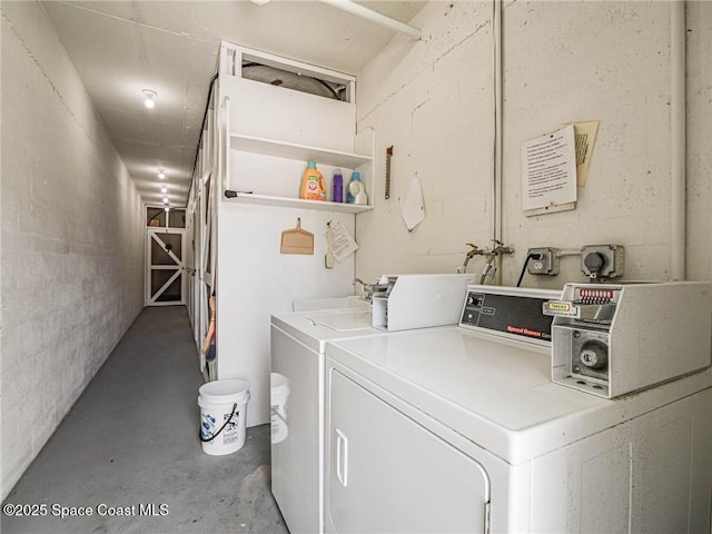2800 Indian River Blvd Unit L-2, Vero Beach, FL 32960 - communal laundry room with independent washer and dryer