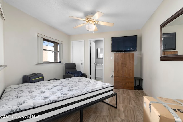 bedroom featuring connected bathroom and ceiling fan