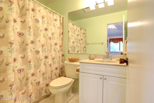5760 Marina Dr Unit 4, Sebastian, FL 32958 - bathroom with tile patterned floors, vanity, and toilet