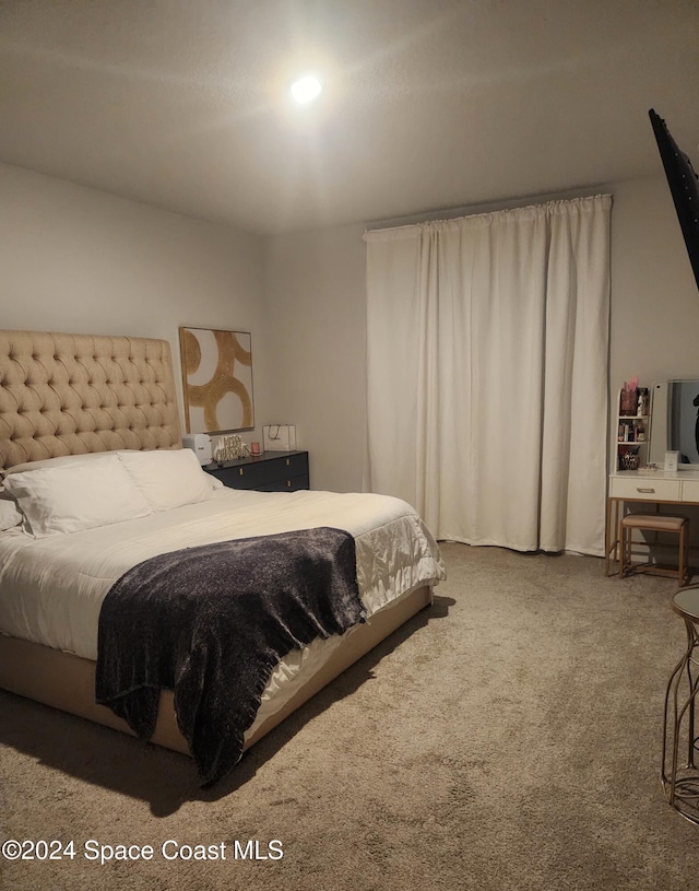 bedroom featuring carpet floors