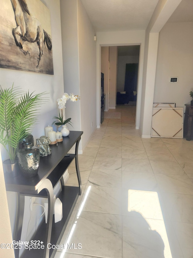 1631 Wake Forest Rd NW, Palm Bay, FL 32907 - hallway with marble finish floor