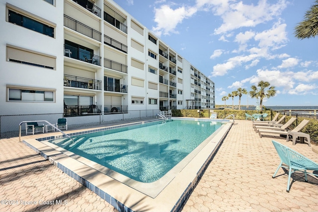 view of pool with a patio area