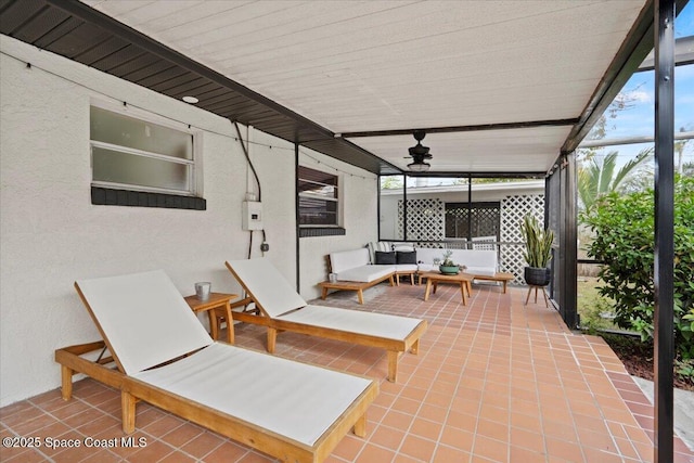 view of patio featuring outdoor lounge area and ceiling fan