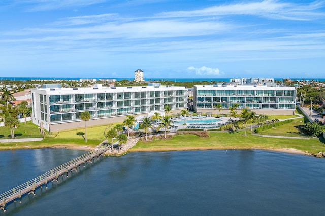 birds eye view of property featuring a water view