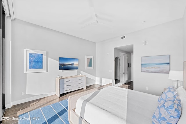 bedroom with hardwood / wood-style floors and ceiling fan