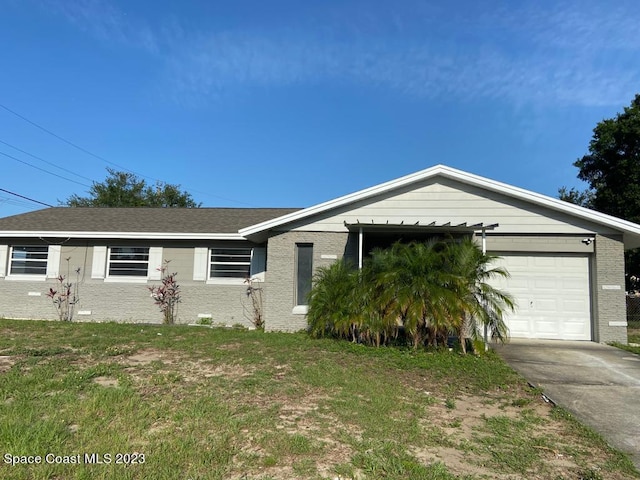 single story home with a garage and a front yard