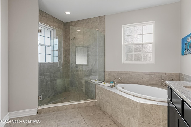 bathroom with separate shower and tub, tile patterned floors, and vanity