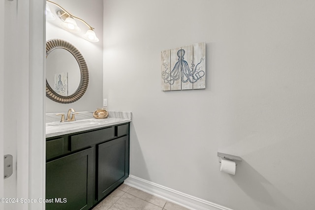 bathroom with tile patterned floors and vanity