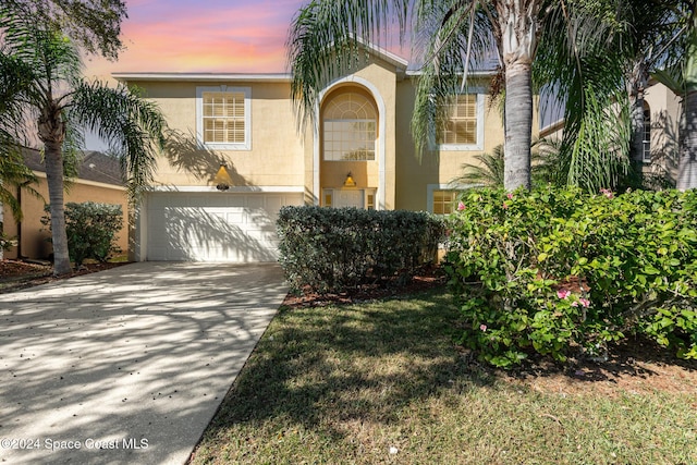 view of front of property featuring a garage