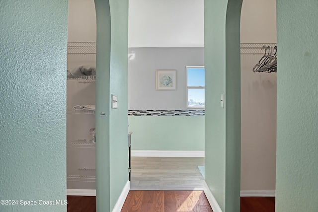 hallway featuring hardwood / wood-style floors