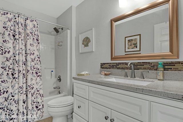 full bathroom featuring tasteful backsplash, shower / bathtub combination with curtain, vanity, and toilet