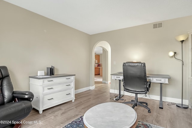 office area featuring light wood-type flooring