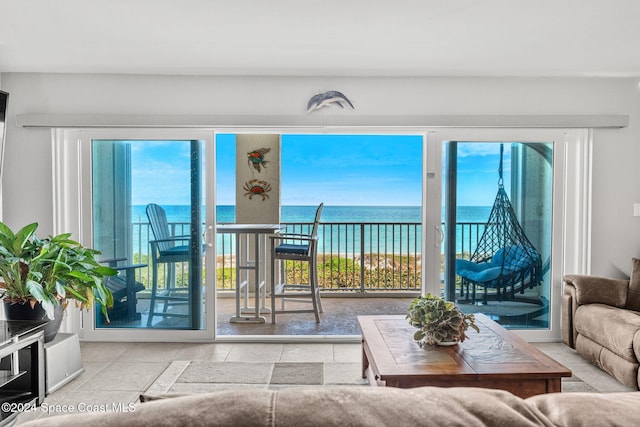 living room featuring a water view