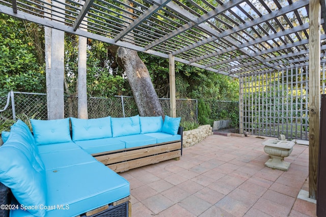 view of patio / terrace with a pergola and an outdoor hangout area