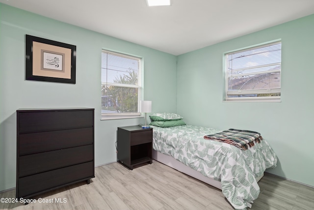 bedroom featuring light hardwood / wood-style flooring