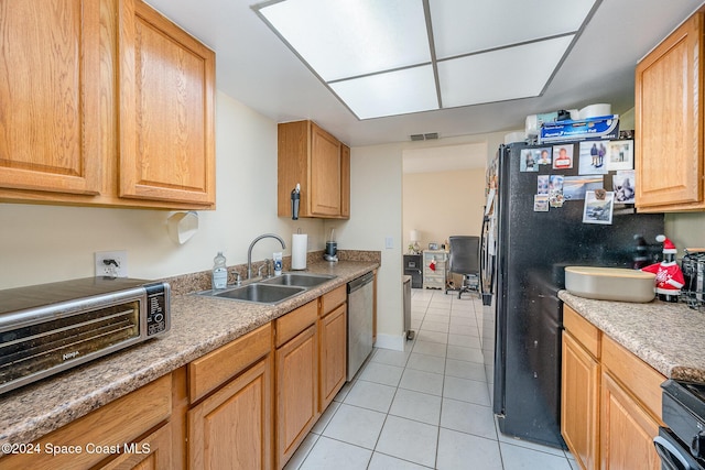 kitchen with refrigerator, sink, black electric range, stainless steel dishwasher, and light tile patterned floors