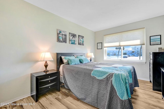 bedroom featuring light hardwood / wood-style flooring