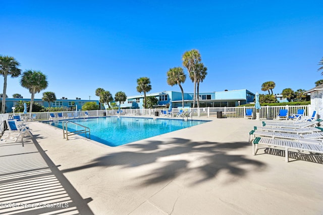 view of pool featuring a patio area