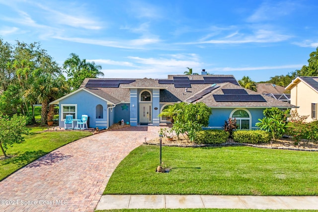 view of front of house with a front lawn