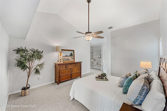 bedroom with light carpet, ceiling fan, and lofted ceiling