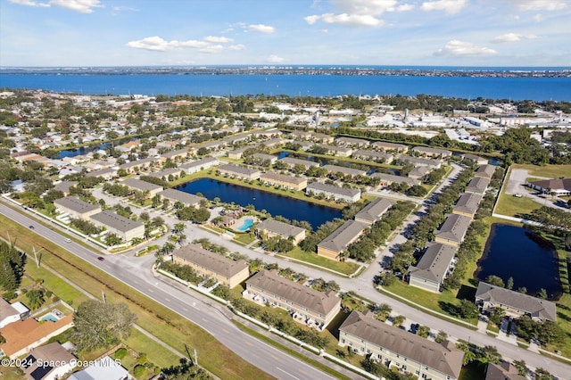 bird's eye view with a water view