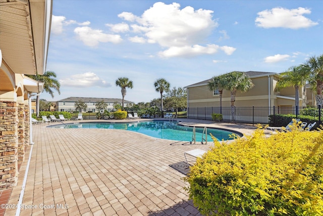 view of pool with a patio