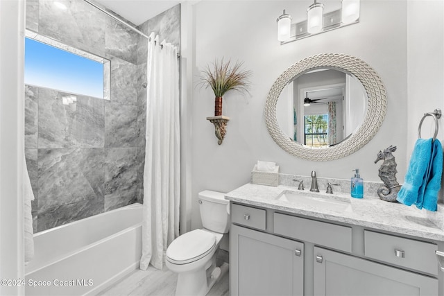 bathroom featuring toilet, vanity, and shower / bathtub combination with curtain