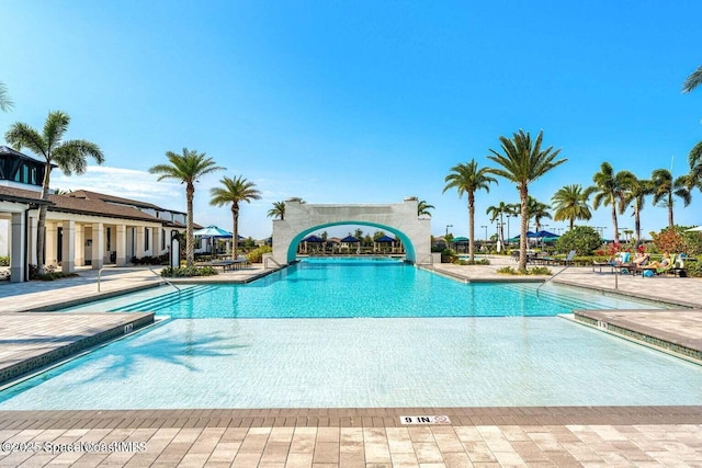 community pool with a patio