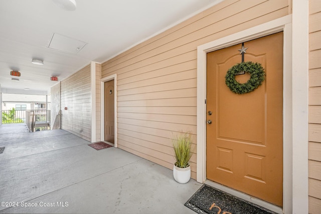 entrance to property with a porch